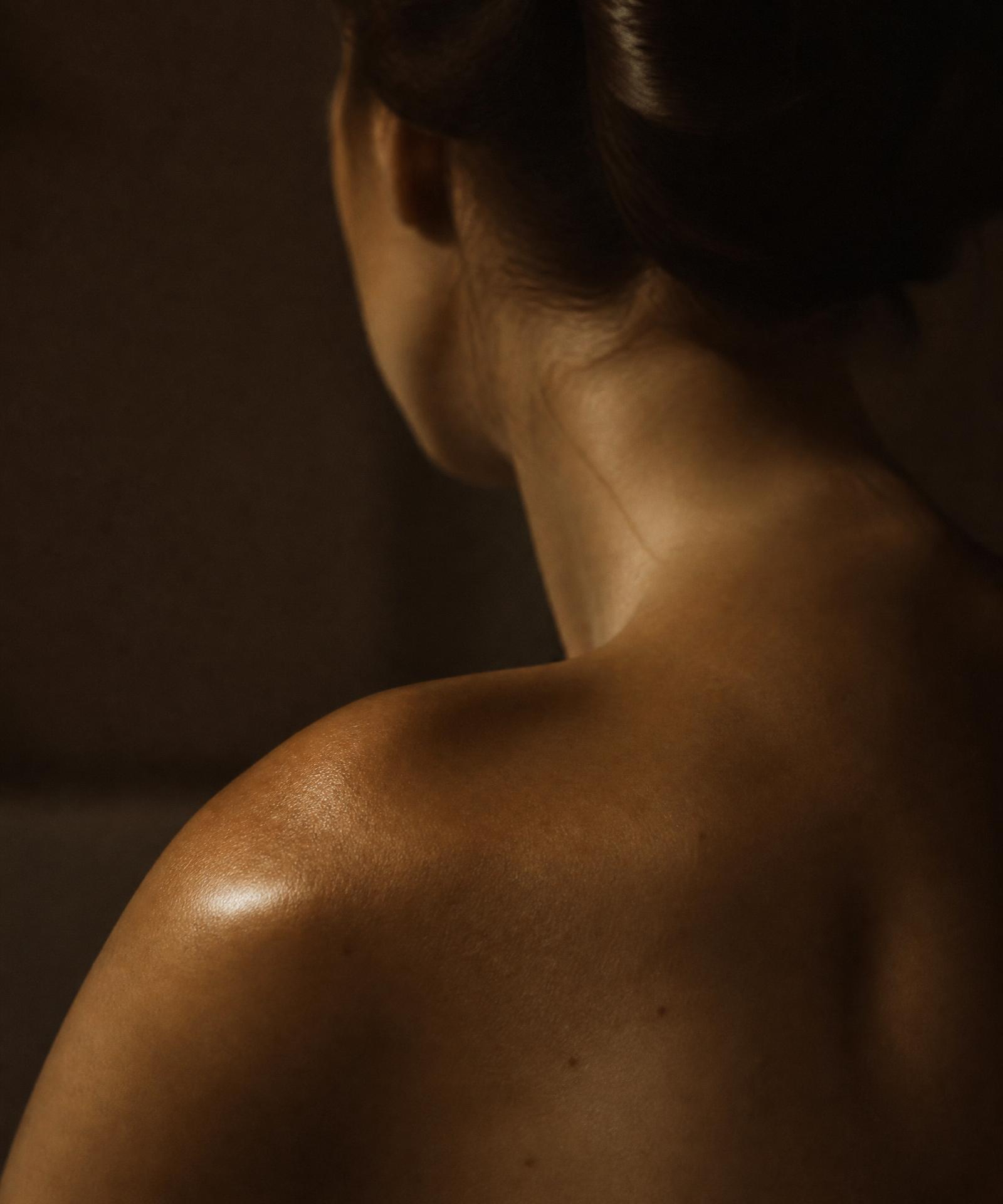 Close-up of a shoulder in warm directional light